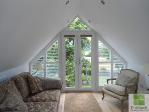 bespoke shaped shutters on a triangle window
