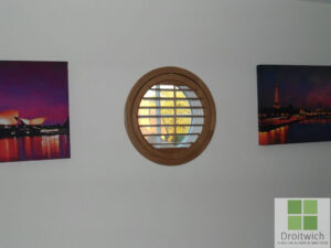 Round window with oak shutter