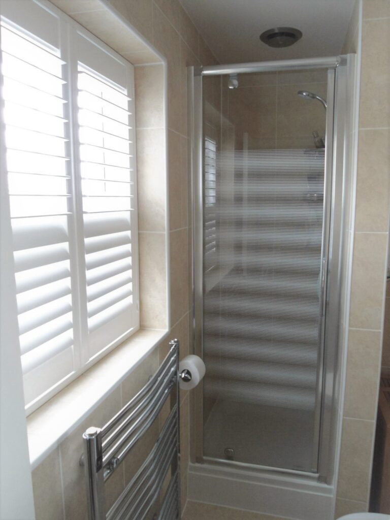 Bathroom window white shutter