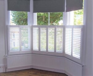 white bay window cafe shutters