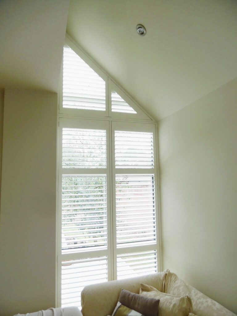 Triangle window shutters made to measure the window