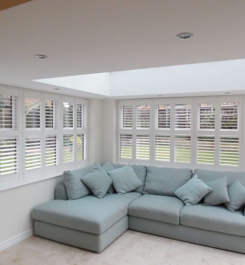 Conservatory with white shutters