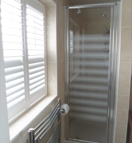 Bathroom window white shutter