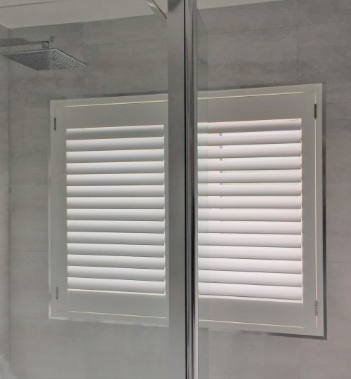 Shower room with white shutter