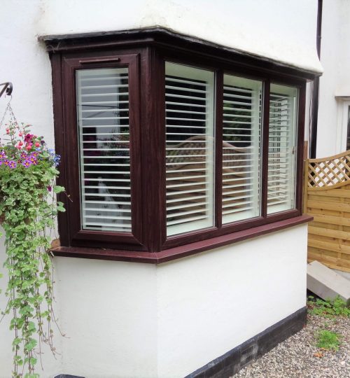 outside view of white lounge shutters