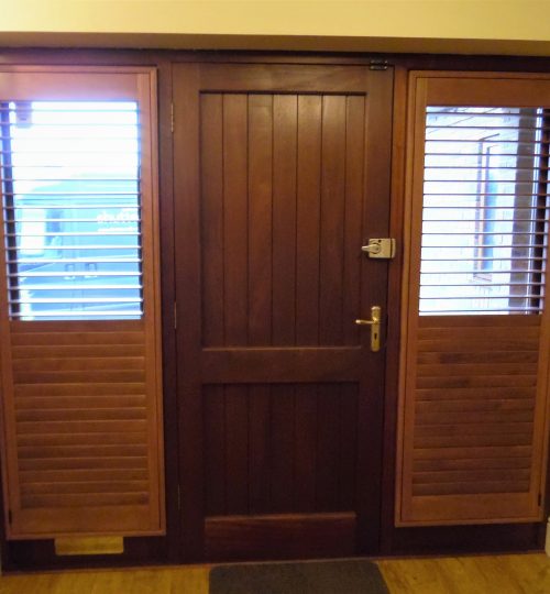 Brown front door shutters