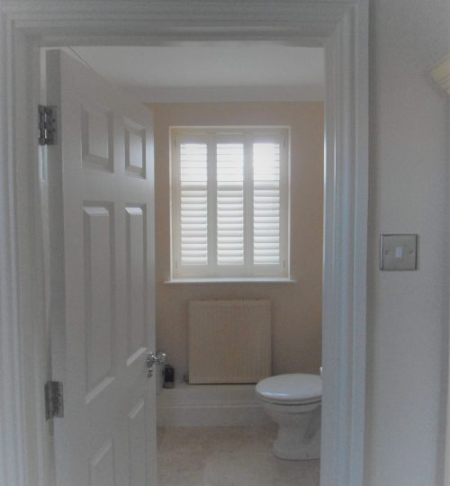 White bathroom shutter