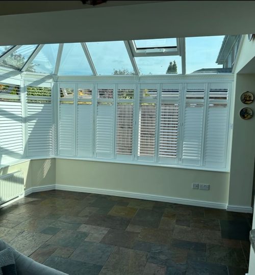 Opened and closed Conservatory shutters in Droitwich.