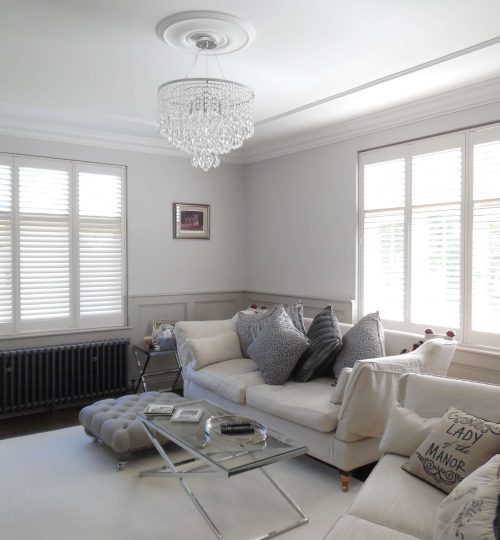 Cosy lounge with shite full house shutters