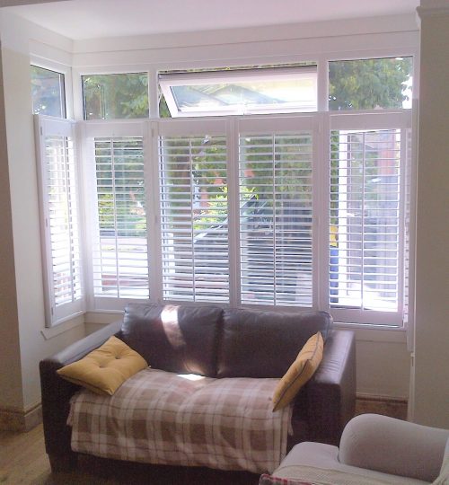 white cafe shutters in lounge window